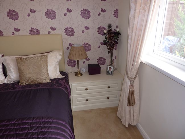 Purple and white bedroom design